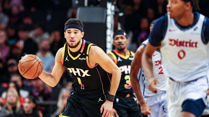Jan 25, 2025; Phoenix, Arizona, USA; Phoenix Suns guard Devin Booker (1) dribbles the ball during the first quarter against the Washington Wizards at Footprint Center. Mandatory Credit: Aryanna Frank-Imagn Images Jan 25, 2025; Phoenix, Arizona, USA; Phoenix Suns guard Devin Booker (1) dribbles the ball during the first quarter against the Washington Wizards at Footprint Center. Mandatory Credit: Aryanna Frank-Imagn Images
