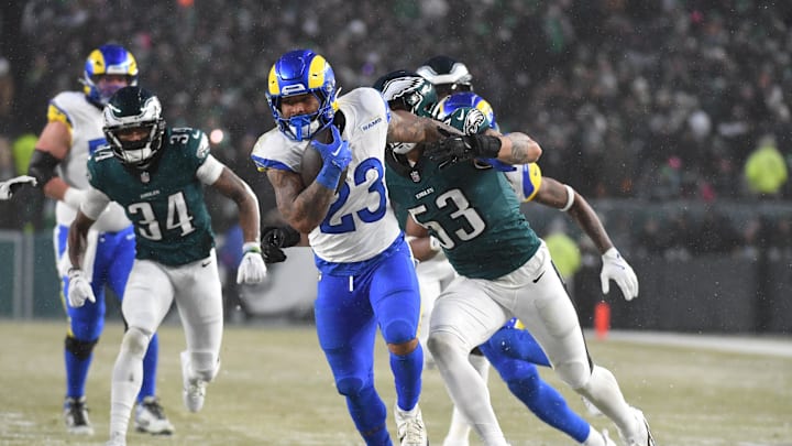 Jan 19, 2025; Philadelphia, Pennsylvania, USA; Los Angeles Rams running back Kyren Williams (23) runs past Philadelphia Eagles linebacker Zack Baun (53) during the third quarter against the Philadelphia Eagles in a 2025 NFC divisional round game at Lincoln Financial Field. Mandatory Credit: Eric Hartline-Imagn Images