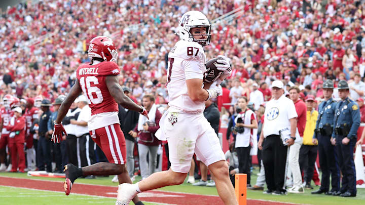 Oct 18, 2025; Fayetteville, Arkansas, USA; Texas A&M Aggies tight end Nate Boerkircher (87) scores a touchdown in the second quarter against the Arkansas Razorbacks at Donald W. Reynolds Razorback Stadium. Mandatory Credit: Nelson Chenault-Imagn Images