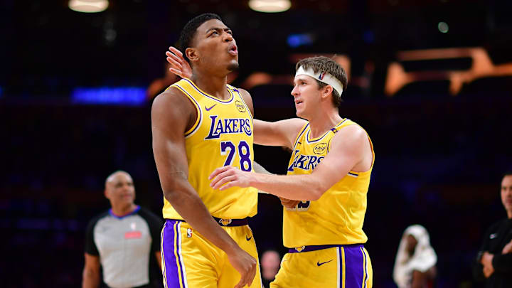 January 15, 2025; Los Angeles, California, USA; Los Angeles Lakers forward Rui Hachimura (28) reacts with guard Austin Reaves (15) after scoring a basket and drawing the foul against the Miami Heat during the second half at Crypto.com Arena. Mandatory Credit: Gary A. Vasquez-Imagn Images