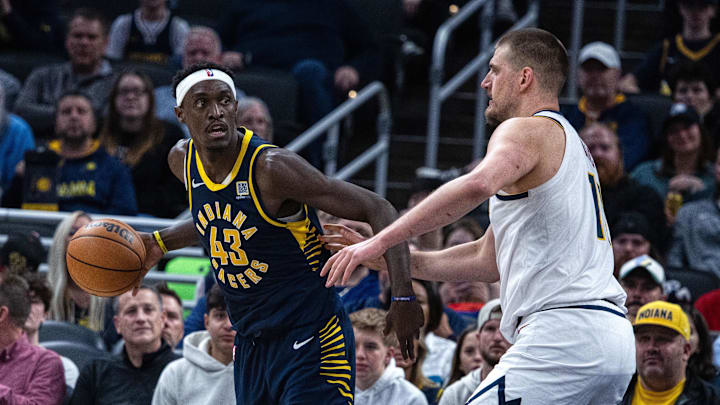 Feb 24, 2025; Indianapolis, Indiana, USA; Indiana Pacers forward Pascal Siakam (43) dribbles the ball while Denver Nuggets center Nikola Jokic (15) defends in the second half at Gainbridge Fieldhouse. Mandatory Credit: Trevor Ruszkowski-Imagn Images Feb 24, 2025; Indianapolis, Indiana, USA; Indiana Pacers forward Pascal Siakam (43) dribbles the ball while Denver Nuggets center Nikola Jokic (15) defends in the second half at Gainbridge Fieldhouse. Mandatory Credit: Trevor Ruszkowski-Imagn Images