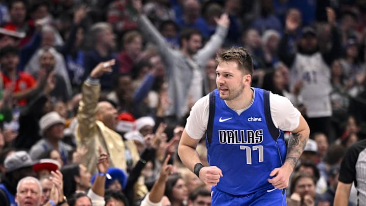 Former Dallas Maverick Luka Dončić running towards the Los Angeles Lakers and LeBron James Former Dallas Maverick Luka Dončić running towards the Los Angeles Lakers and LeBron James