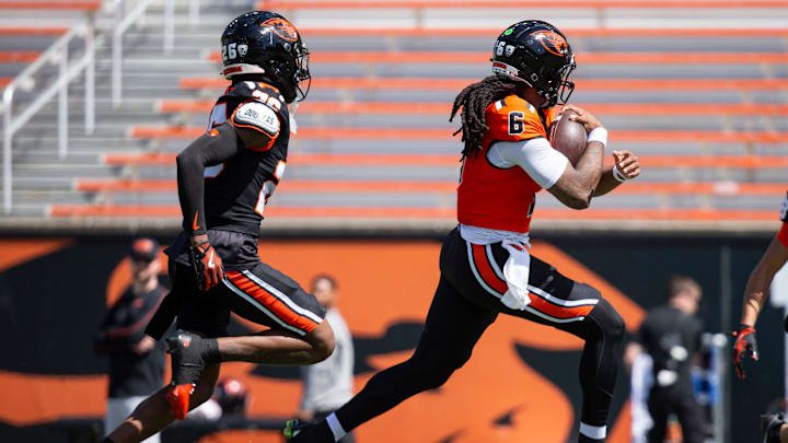 Oregon State's Maalik Murphy, right, runs the ball during the Oregon State Spring Game at Reser Stadium on Saturday, April 19, 2025, in Corvallis, Ore.