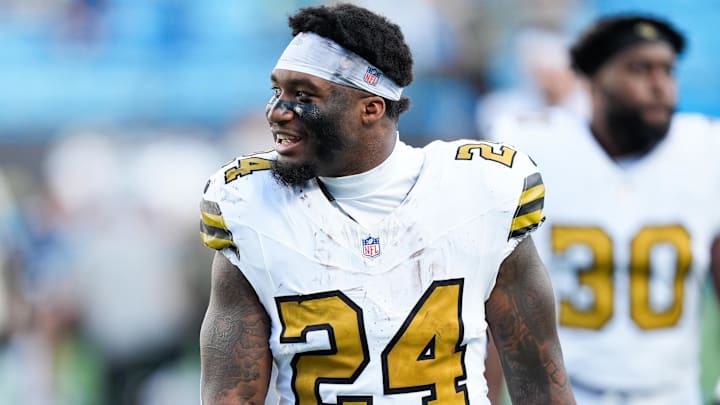 Nov 9, 2025; Charlotte, North Carolina, USA; New Orleans Saints running back Devin Neal (24) looks on after the game against the Carolina Panthers at Bank of America Stadium. Mandatory Credit: Jim Dedmon-Imagn Images