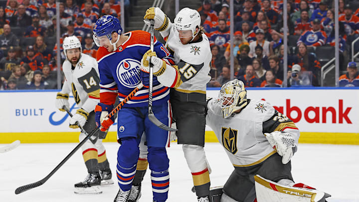 Edmonton Oilers forward Zach Hyman (18) tries to deflect a shot on Vegas Golden Knights goaltender