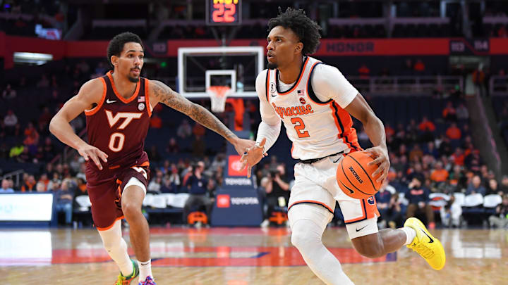 Jan 21, 2026; Syracuse, N.Y.; Syracuse guard J.J. Starling (2) drives against Virginia Tech guard Jailen Bedford (0).
