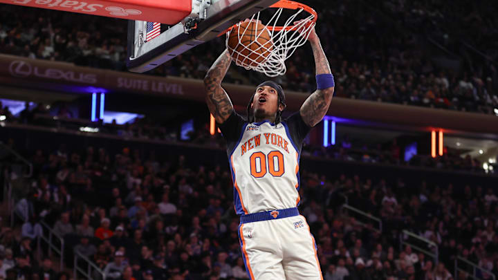 Nov 30, 2025; New York, New York, USA;  New York Knicks guard Jordan Clarkson (00) dunks in the fourth quarter against the Toronto Raptors at Madison Square Garden. Mandatory Credit: Wendell Cruz-Imagn Images