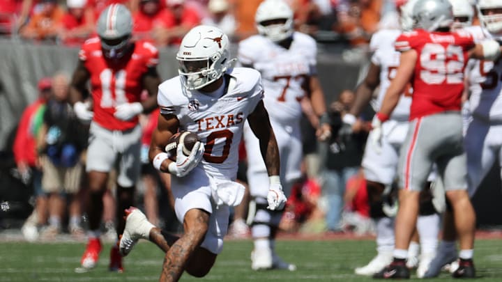 Aug 30, 2025; Columbus, Ohio, USA; Texas Longhorns wide receiver DeAndre Moore Jr. (0) makes a catch against the Ohio State Buckeyes in the second half at Ohio Stadium. Mandatory Credit: Joseph Maiorana-Imagn Images