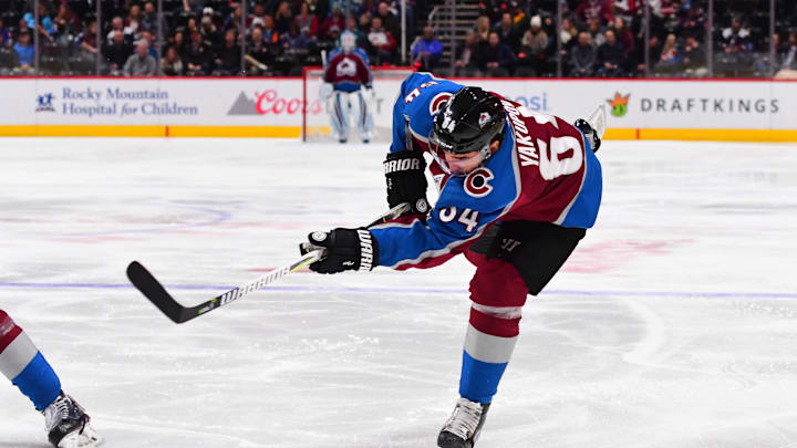 Feb 6, 2018; Denver, CO, USA; Colorado Avalanche right wing Nail Yakupov (64) shoots the puck in the second period against the San Jose Sharks at the Pepsi Center. Mandatory Credit: Ron Chenoy-Imagn Images