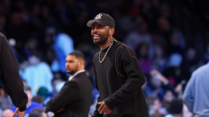 Mar 24, 2025; Brooklyn, New York, USA; Dallas Mavericks guard Kyrie Irving (11) looks on during the first quarter against the Brooklyn Nets at Barclays Center. Mandatory Credit: Vincent Carchietta-Imagn Images