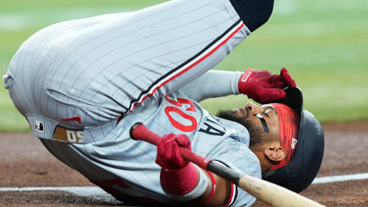 Jun 26, 2024; Phoenix, Arizona, USA; Minnesota Twins shortstop Willi Castro (50) hits the first while avoiding a pitch against the Arizona Diamondbacks during the first inning at Chase Field. Mandatory Credit: Joe Camporeale-USA TODAY Sports