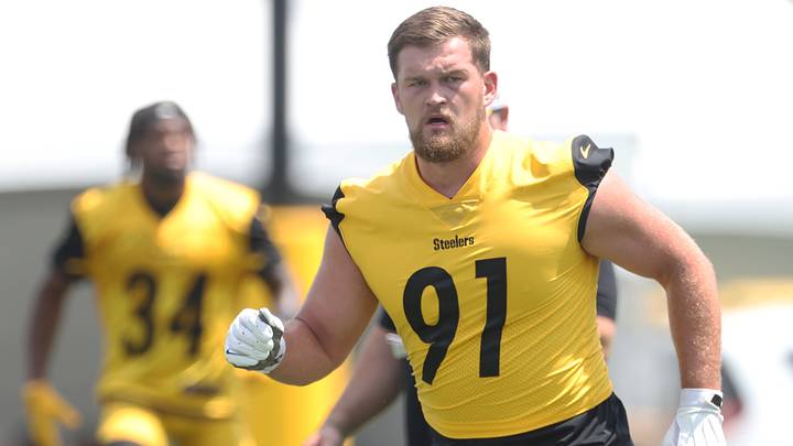 Jul 24, 2025; Latrobe, PA, USA; Pittsburgh Steelers defensive lineman Logan Lee (91) participates in drills during training camp at Saint Vincent College. Mandatory Credit: Charles LeClaire-Imagn Images Jul 24, 2025; Latrobe, PA, USA; Pittsburgh Steelers defensive lineman Logan Lee (91) participates in drills during training camp at Saint Vincent College. Mandatory Credit: Charles LeClaire-Imagn Images