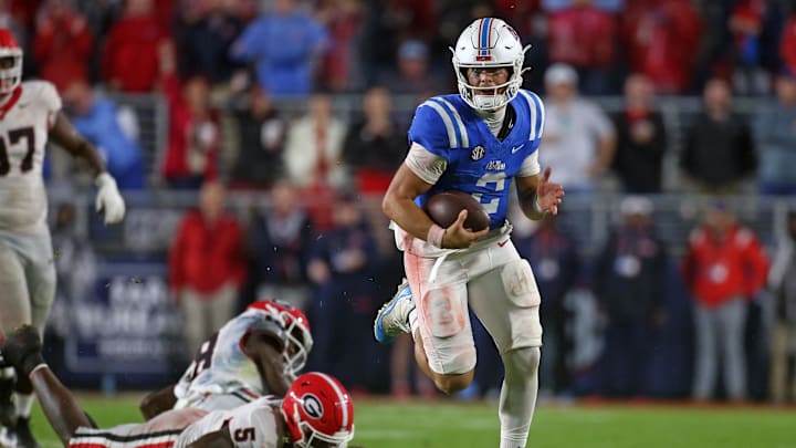 Nov 9, 2024; Oxford, Mississippi, USA; Mississippi Rebels quarterback Jaxson Dart (2) runs the ball during the second half against the Georgia Bulldogs at Vaught-Hemingway Stadium.  
