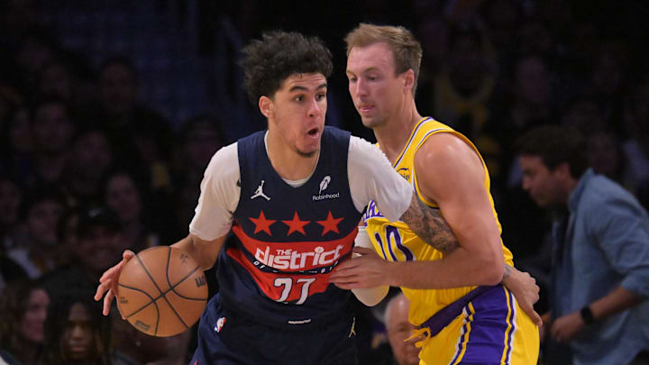 Wizards guard Will Riley is defended by Lakers guard Luke Kennard during Washington’s 58th loss of the season. The Wizards are in a statistical tie with Indiana for the NBA’s worst record. Wizards guard Will Riley is defended by Lakers guard Luke Kennard during Washington’s 58th loss of the season. The Wizards are in a statistical tie with Indiana for the NBA’s worst record.