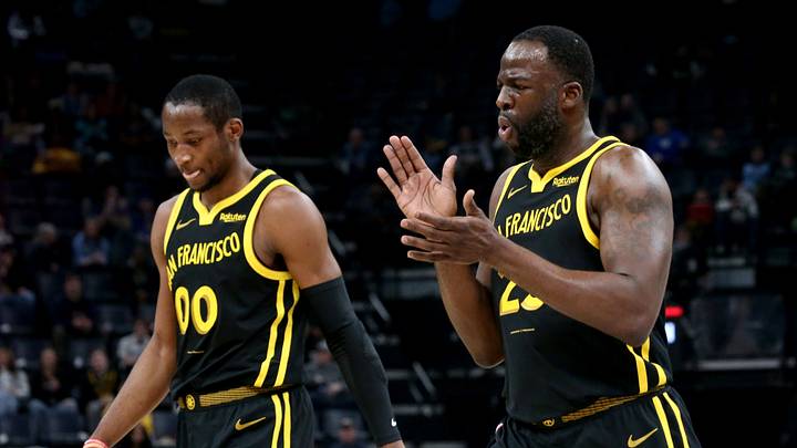 Memphis, Tennessee, USA; Golden State Warriors forward Jonathan Kuminga (00) and Golden State Warriors forward Draymond Green (23) walk to the bench at the end of the first quarter against the Memphis Grizzlies at FedExForum. Mandatory Credit: Petre Thomas-USA TODAY Sports Memphis, Tennessee, USA; Golden State Warriors forward Jonathan Kuminga (00) and Golden State Warriors forward Draymond Green (23) walk to the bench at the end of the first quarter against the Memphis Grizzlies at FedExForum. Mandatory Credit: Petre Thomas-USA TODAY Sports
