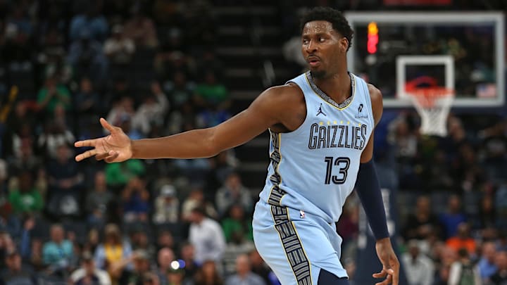 Mar 31, 2025; Memphis, Tennessee, USA; Memphis Grizzlies forward Jaren Jackson Jr. (13) reacts after a three point basket during the third quarter against the Boston Celtics at FedExForum. Mandatory Credit: Petre Thomas-Imagn Images