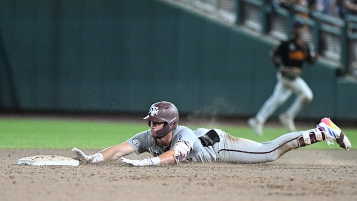 Texas A&M Aggies first baseman Gavin Grahovac (9) slides into second base.