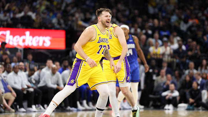 Mar 24, 2025; Orlando, Florida, USA; Los Angeles Lakers guard Luka Doncic (77) reacts after a basket against the Orlando Magic in the first quarter at Kia Center. Mandatory Credit: Nathan Ray Seebeck-Imagn Images Mar 24, 2025; Orlando, Florida, USA; Los Angeles Lakers guard Luka Doncic (77) reacts after a basket against the Orlando Magic in the first quarter at Kia Center. Mandatory Credit: Nathan Ray Seebeck-Imagn Images