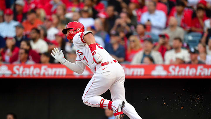 May 1, 2026; Anaheim, California, USA; Los Angeles Angels center fielder Mike Trout (27) runs after hitting a single against the New York Mets during the first inning at Angel Stadium. Mandatory Credit: Gary A. Vasquez-Imagn Images