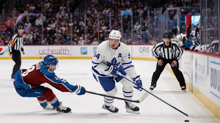 Jan 8, 2022; Denver, Colorado, USA; Toronto Maple Leafs center Auston Matthews (34) controls the