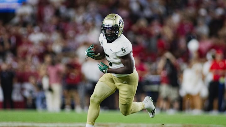 Sep 7, 2024; Tuscaloosa, Alabama, USA; South Florida Bulls running back Nay'Quan Wright (5) runs the ball against the Alabama Crimson Tide during the fourth quarter at Bryant-Denny Stadium. Mandatory Credit: William McLelland-Imagn Images