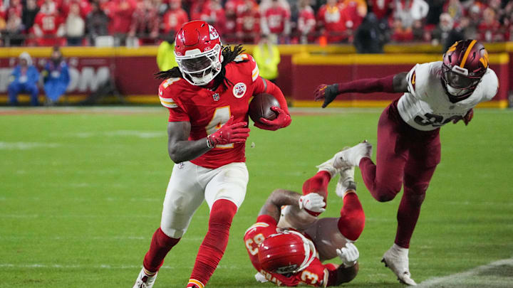 Oct 27, 2025; Kansas City, Missouri, USA; Kansas City Chiefs wide receiver Rashee Rice (4) carries the ball against the Washington Commanders during the fourth quarter of the game at GEHA Field at Arrowhead Stadium. Mandatory Credit: Denny Medley-Imagn Images Oct 27, 2025; Kansas City, Missouri, USA; Kansas City Chiefs wide receiver Rashee Rice (4) carries the ball against the Washington Commanders during the fourth quarter of the game at GEHA Field at Arrowhead Stadium. Mandatory Credit: Denny Medley-Imagn Images