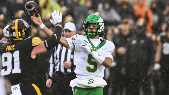 Dante Moore led the Oregon Ducks on a game-winning drive against Iowa.