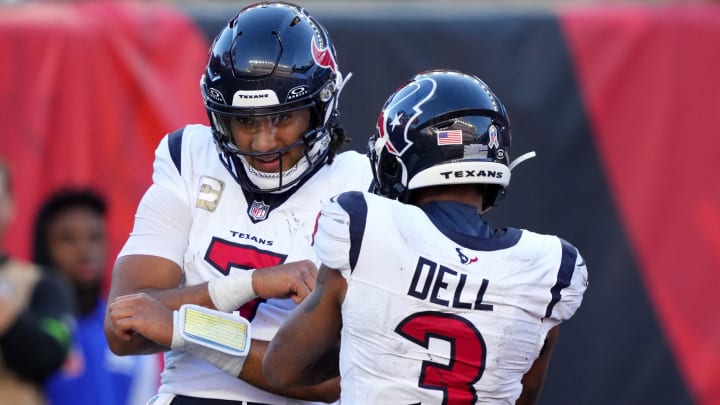 Houston Texans quarterback C.J. Stroud (7) celebrates a touchdown run Houston Texans wide receiver Tank Dell (3) in the fourth quarter of a Week 10 NFL football game between the Houston Texans and the Cincinnati Bengals, Sunday, Nov. 12, 2023, at Paycor Stadium in Cincinnati. The Houston Texans won, 30-27.