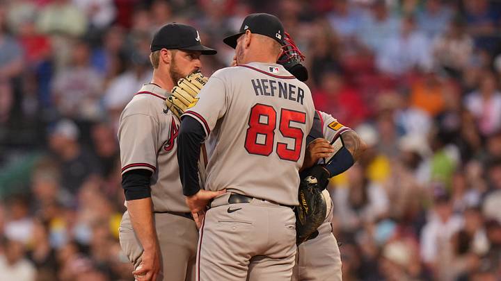 May 27, 2026; Boston, Massachusetts, USA; Atlanta Braves pitching coach Jeremy Hefner (85) talks with pitcher Bryce Elder (55) and catcher Chadwick Tromp (39) as they take on the Boston Red Sox in the fourth inning at Fenway Park. Mandatory Credit: David Butler II-Imagn Images