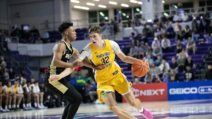 Duke basketball signee Cooper Flagg drives past Anthony Brown of Paul VI at the City of Palms Classic