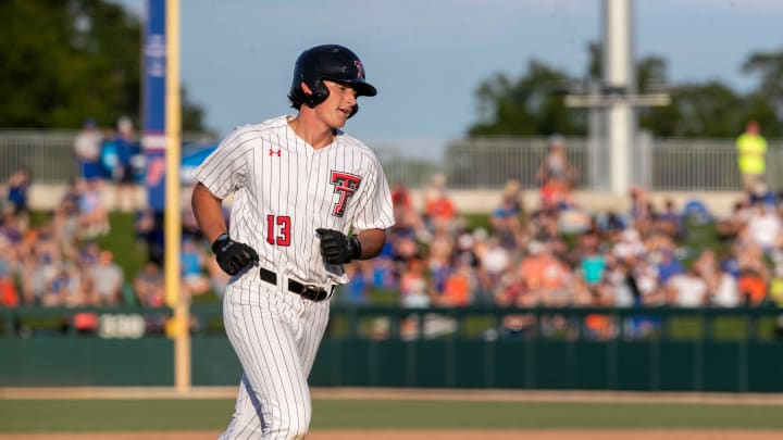 Texas Tech infielder Gavin Kash (13) with a home run against Florida in Round 2 of NCAA Regionals, Saturday, June 3, 2023, at Condron Family Ballpark in Gainesville, Florida. The Gators fell to the Red Raiders 5-4. They will face U Conn Sunday. [Cyndi Chambers/ Gainesville Sun] 2023