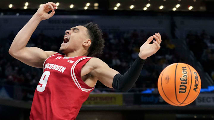 Wisconsin Badgers guard John Tonje (9) loses control of the ball during the first half of the 2025 TIAA Big Ten Men’s Basketball Tournament final game against the Michigan Wolverines on Sunday, March 16, 2025, at Gainbridge Fieldhouse in Indianapolis.