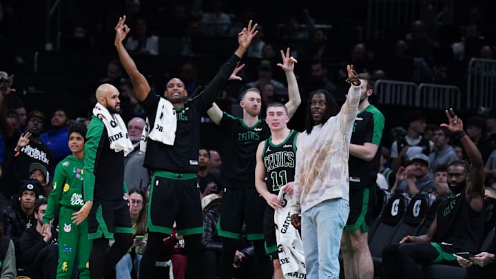 Dec 27, 2024; Boston, Massachusetts, USA; The Boston Celtics bench reacts after a three point basket against the Indiana Pacers in the second half at TD Garden. Mandatory Credit: David Butler II-Imagn Images