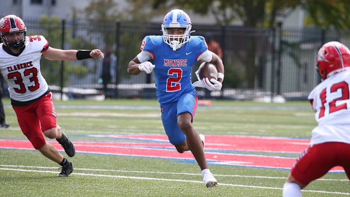 Monroe wide receiver Messiah Hampton flies upfield for yards after the catch in the first half during their season opening game Saturday, Sept. 7, 2024 at Monroe High School.