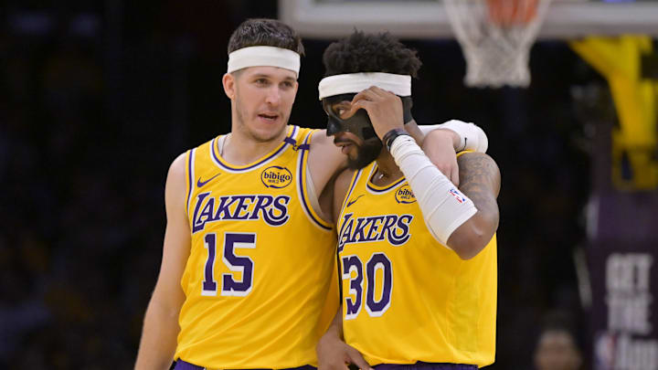 Feb 10, 2025; Los Angeles, California, USA; Los Angeles Lakers guard Austin Reaves (15) talks with guard Jordan Goodwin (30) in the second half against the Utah Jazz at Crypto.com Arena. Mandatory Credit: Jayne Kamin-Oncea-Imagn Images Feb 10, 2025; Los Angeles, California, USA; Los Angeles Lakers guard Austin Reaves (15) talks with guard Jordan Goodwin (30) in the second half against the Utah Jazz at Crypto.com Arena. Mandatory Credit: Jayne Kamin-Oncea-Imagn Images