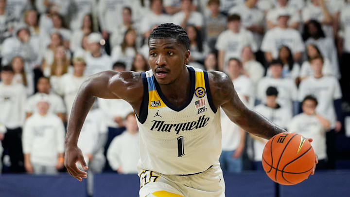 Marquette Golden Eagles guard Kam Jones (1) drives up the court during the first half of the game against George Mason on Friday, Nov. 8, 2024, at the Al McGuire Center in Milwaukee, Wisconsin.