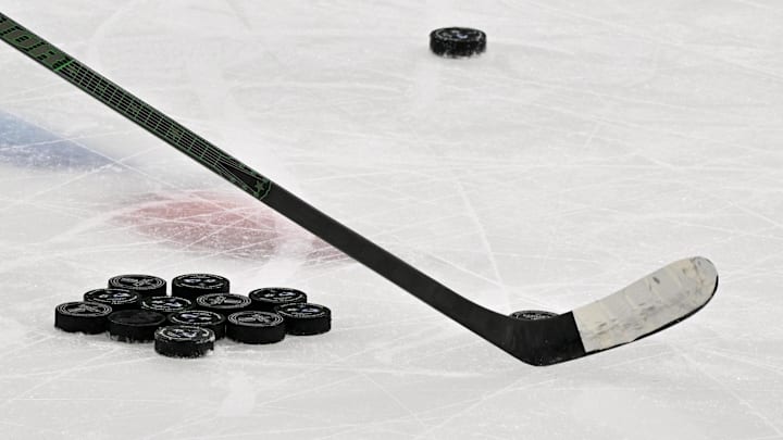 May 3, 2025; Dallas, Texas, USA; A view of a hockey stick and pucks before the game between the Dallas Stars and the Colorado Avalanche in game seven of the first round of the 2025 Stanley Cup Playoffs at American Airlines Center. Mandatory Credit: Jerome Miron-Imagn Images
