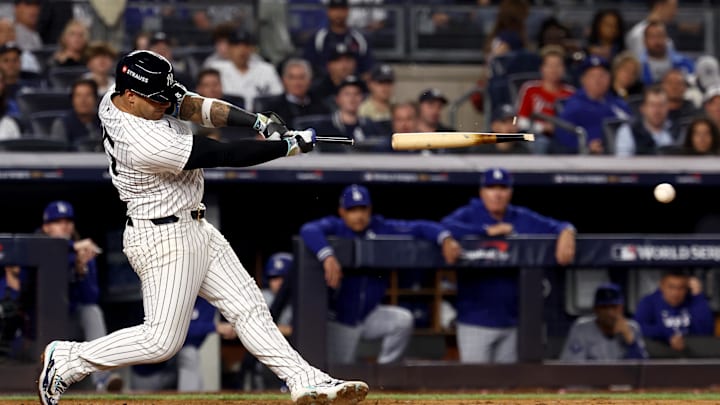 Oct 30, 2024; New York, New York, USA; New York Yankees second baseman Gleyber Torres (25) breaks his bat on a ground out during the seventh inning against the Los Angeles Dodgers in game five of the 2024 MLB World Series at Yankee Stadium. Mandatory Credit: Vincent Carchietta-Imagn Images