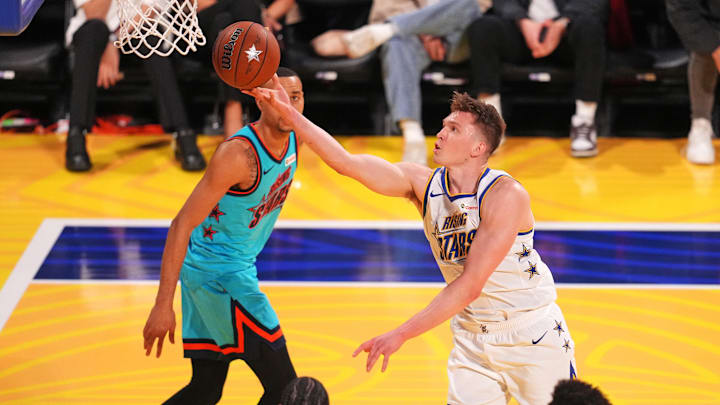 Feb 14, 2025; San Francisco, California, USA; Team C forward Dalton Knecht (4) of the Los Angeles Lakers controls the ball during the 2025 NBA Rising Stars Game at Chase Center. Mandatory Credit: Cary Edmondson-Imagn Images