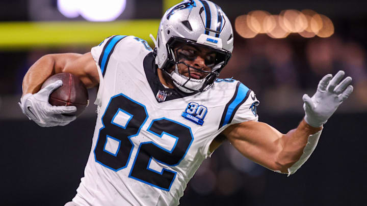 Jan 5, 2025; Atlanta, Georgia, USA; Carolina Panthers tight end Tommy Tremble (82) runs after a catch against the Atlanta Falcons in overtime at Mercedes-Benz Stadium. Mandatory Credit: Brett Davis-Imagn Images