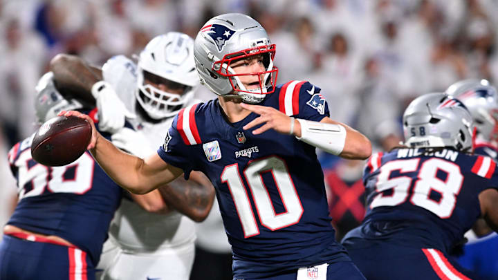 Oct 5, 2025; Orchard Park, New York, USA; New England Patriots quarterback Drake Maye (10) drops back to pass against the Buffalo Bills during the first half at Highmark Stadium. Mandatory Credit: Mark Konezny-Imagn Images
