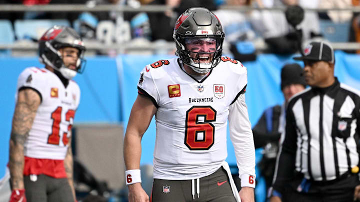 Dec 21, 2025; Charlotte, North Carolina, USA; Tampa Bay Buccaneers quarterback Baker Mayfield (6) reacts after a touchdown during the first half against the Carolina Panthers at Bank of America Stadium. Mandatory Credit: Bob Donnan-Imagn Images