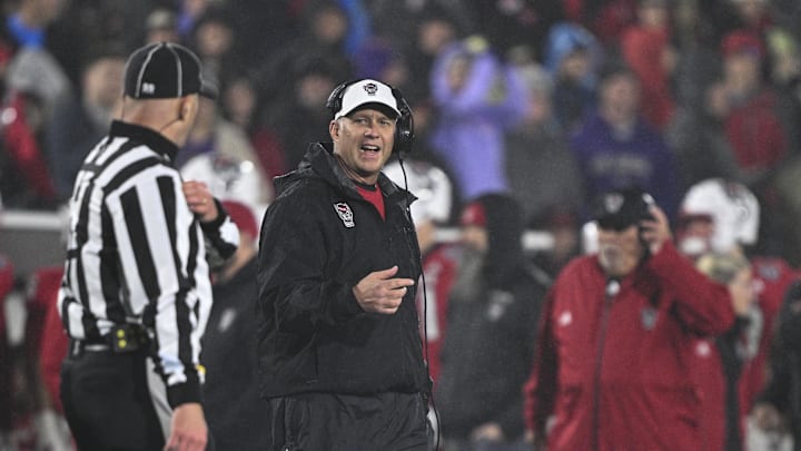 Dec 28, 2024; Annapolis, MD, USA; North Carolina State Wolfpack head coach Dave Doeren reacts after a play during the first half of the Go Bowling Military Bowl at Navy-Marine Corps Memorial Stadium. Mandatory Credit: Tommy Gilligan-Imagn Images Dec 28, 2024; Annapolis, MD, USA; North Carolina State Wolfpack head coach Dave Doeren reacts after a play during the first half of the Go Bowling Military Bowl at Navy-Marine Corps Memorial Stadium. Mandatory Credit: Tommy Gilligan-Imagn Images