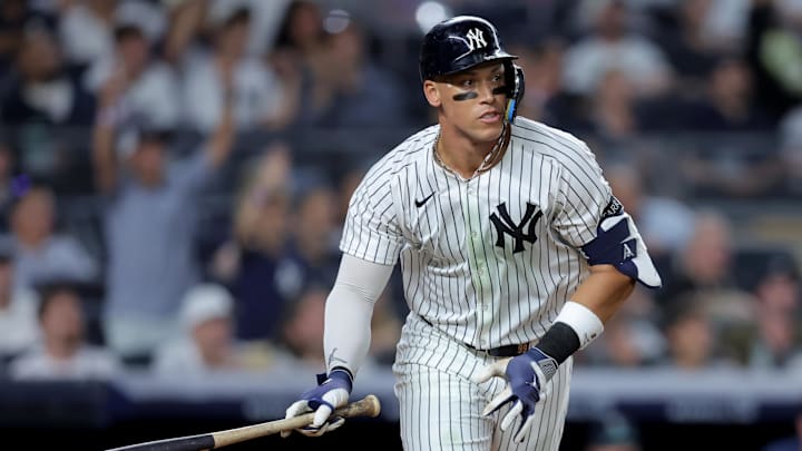 Jul 8, 2025; Bronx, New York, USA; New York Yankees right fielder Aaron Judge (99) watches his solo home run against the Seattle Mariners during the seventh inning at Yankee Stadium. Mandatory Credit: Brad Penner-Imagn Images