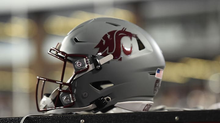 Sep 4, 2021; Pullman, Washington, USA; Washington State Cougars helmet sits during a game against the Utah State Aggies in the first half at Gesa Field at Martin Stadium. Mandatory Credit: James Snook-Imagn Images