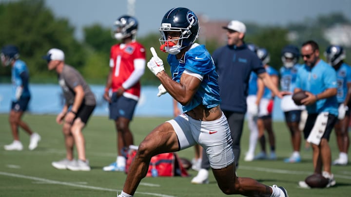 Tennessee Titans wide receiver Elic Ayomanor (5) runs after a catch during the Tennessee Titans first day of training camp at Ascension Saint Thomas Sports Park in Nashville, Tenn., Wednesday, July 23, 2025.