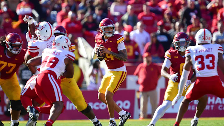 Nov 16, 2024; Los Angeles, California, USA; Southern California Trojans quarterback Jayden Maiava (14) drops back to pass against the Nebraska Cornhuskers during the first half at the Los Angeles Memorial Coliseum. Mandatory Credit: Gary A. Vasquez-Imagn Images Nov 16, 2024; Los Angeles, California, USA; Southern California Trojans quarterback Jayden Maiava (14) drops back to pass against the Nebraska Cornhuskers during the first half at the Los Angeles Memorial Coliseum. Mandatory Credit: Gary A. Vasquez-Imagn Images