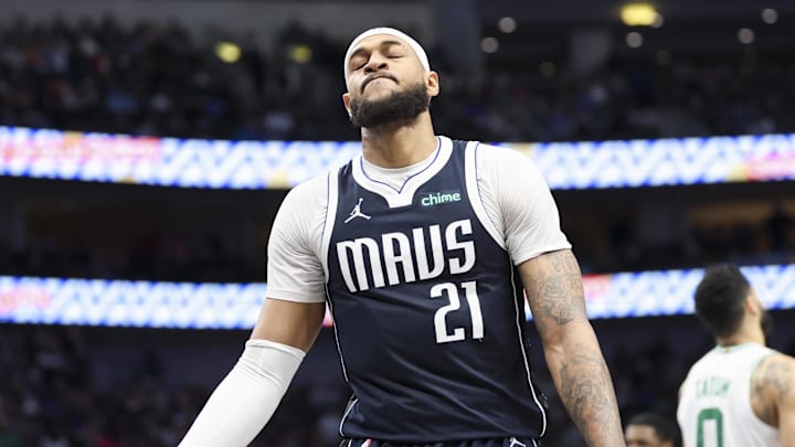Jan 25, 2025; Dallas, Texas, USA;  Dallas Mavericks center Daniel Gafford (21) reacts during the second half against the Boston Celtics at American Airlines Center. Mandatory Credit: Kevin Jairaj-Imagn Images