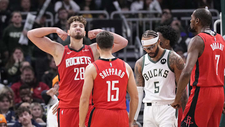 Nov 9, 2025; Milwaukee, Wisconsin, USA; Houston Rockets center Alperen Sengun (28) flexes after making a basket in the final minute of the game at Fiserv Forum. Mandatory Credit: Michael McLoone-Imagn Images
