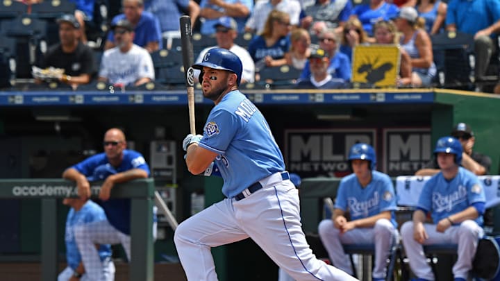 Jul 25, 2018; Kansas City, MO, USA; Kansas City Royals third baseman Mike Moustakas (8) hits an RBI double during the fifth inning against the Detroit Tigers at Kauffman Stadium. Mandatory Credit: Peter G. Aiken/Imagn Images